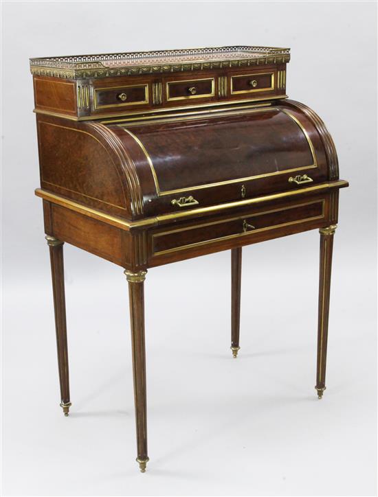 A Charles X ormolu mounted flame mahogany bureau de dame, W.2ft 8in. D.1ft 8in. H.3ft 8in.